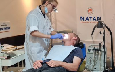 NATAN Dental Clinic with Image of Alpha Omega Logo